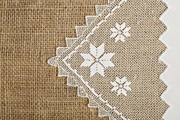 Doily and burlap — Stock Photo, Image