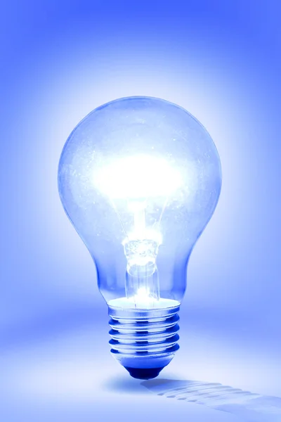 Lit light bulb — Stock Photo, Image