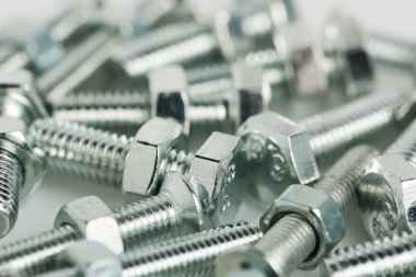 macro of a group of bolts and nuts