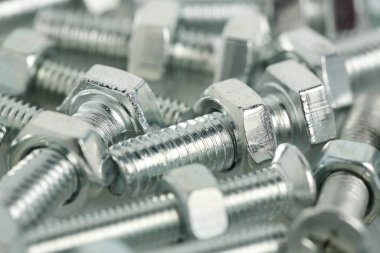 macro of a group of bolts and nuts