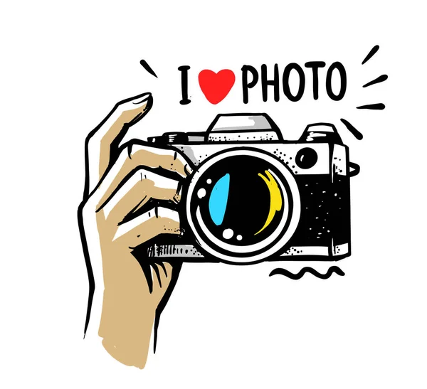 Man hand holding camera on white background — Stock Vector