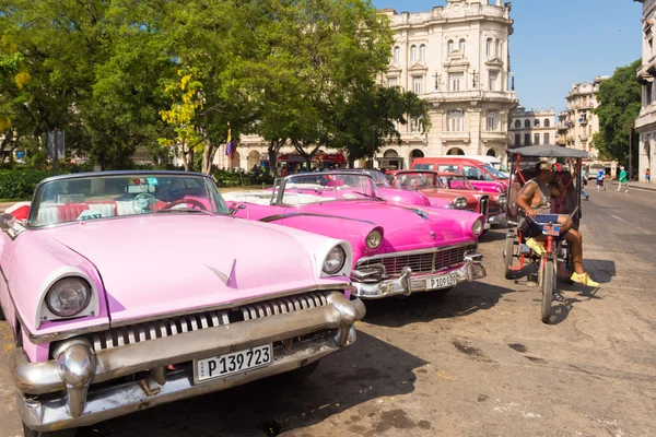 Old cars in the parking lot in Cuba