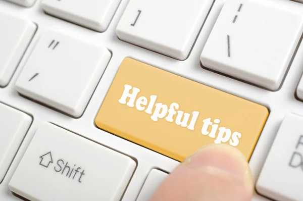 Pressing helpful tips key on keyboard — Stock Photo, Image