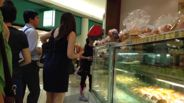 People line up for buying bread — Stock Video