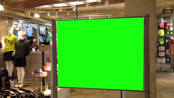 Green billboard for your ad inside Coquitlam Center shopping mall — Stock Video