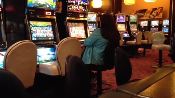 Close up people playing slot machine — Stock Video