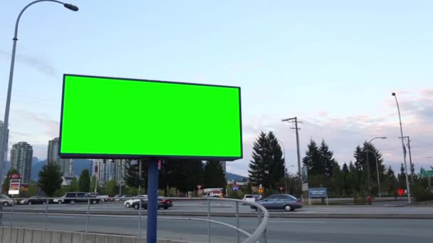Green billboard for your ad on the street — Stock Video