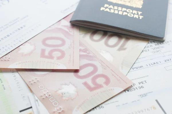 Canada passport with boarding pass on the table — Stock Photo, Image