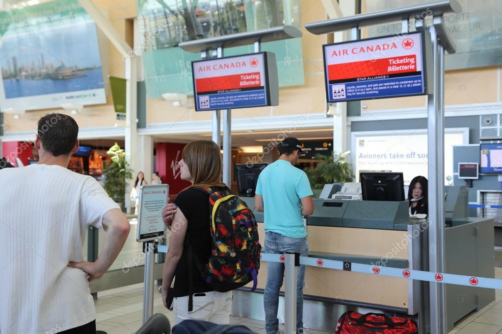Air Canada registration desk at YVR airport Stock Editorial Photo