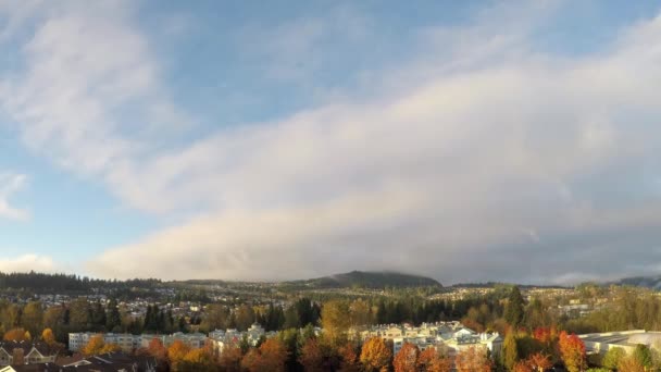 Time lapse of flying clouds with city view — Stock Video