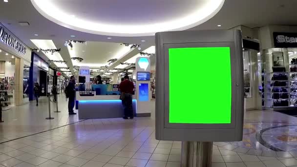 Grön skylt för din annons inne i metropolen på metrotown — Stockvideo