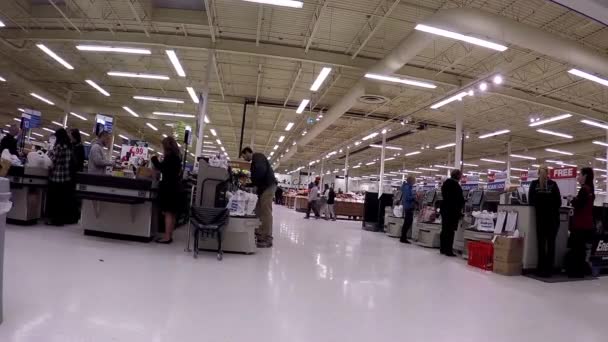 One side of self-check out counter inside Superstore. — Stock Video