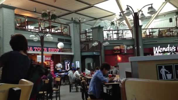 One side of food court at YVR airport — Stock Video