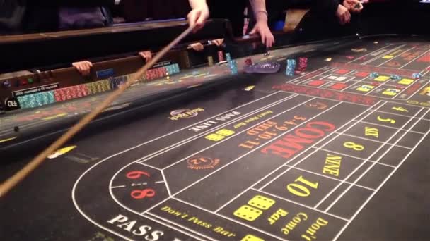 Dice rolling across a craps table — Stock Video