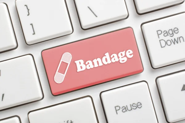 Bandage key on keyboard — Stock Photo, Image