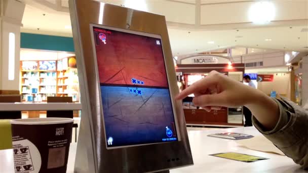 Closeup woman playing tablet pc game inside shopping mall — Stock Video