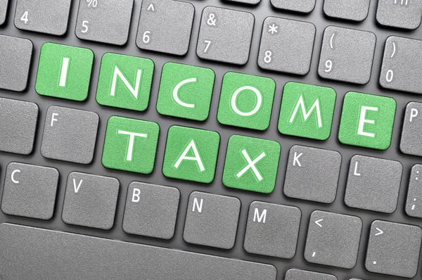 Income tax key on keyboard — Stock Photo, Image