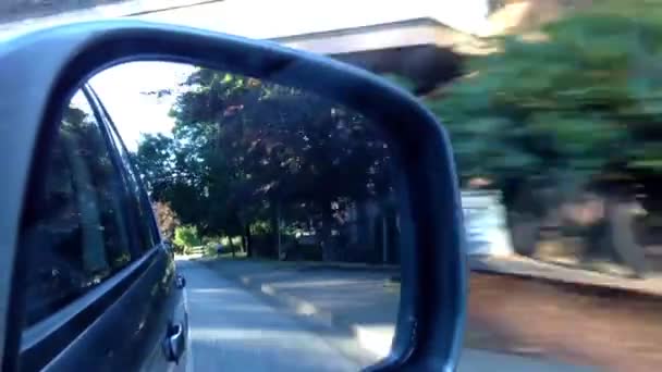 Back road reflected in car mirror — Stock Video