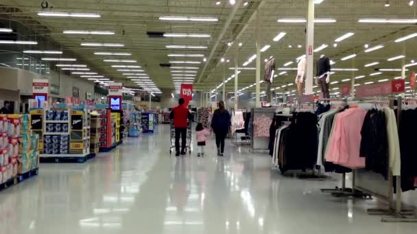 People with shopping cart Walking shopping inside superstore. — Stock Video