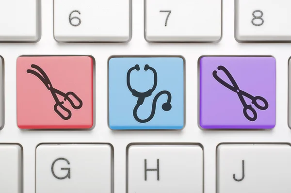 Tecla de ícone médica no teclado — Fotografia de Stock