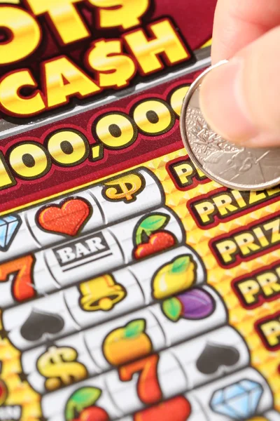 Close up woman scratching lottery tickets. — Stock Photo, Image