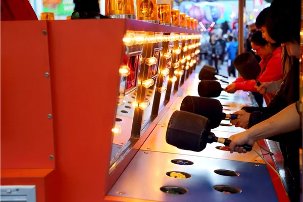 A whacking game at carnival — Stock Photo, Image