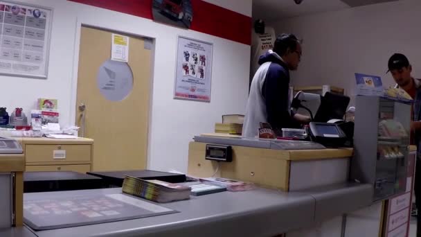 Man mailing letter at post office — Stock Video