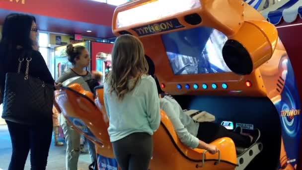 Close up people having fun inside cinema game center — Stock Video