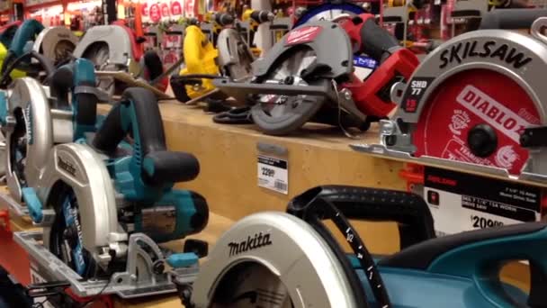 One side of display electric saws at Home Depot store — Stock Video