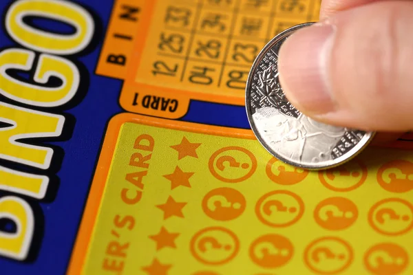 Close up woman scratching lottery tickets.called bingo — Stock Photo, Image