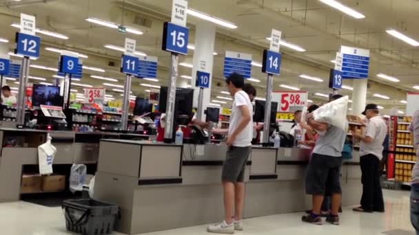 One side of check out counter inside Superstore. — Stock Video