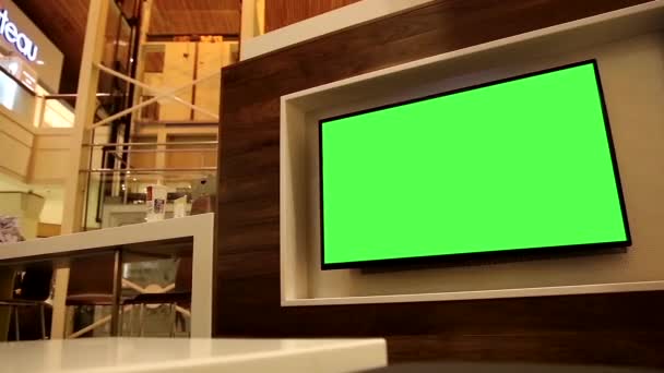 コキットラム センター ショッピング モール内テレビで広告の緑看板. — ストック動画