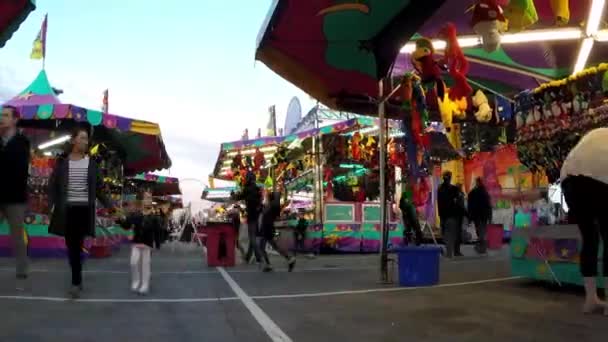 Time lapse of people having fun at the West Coast Amusements Carnival — Stock Video