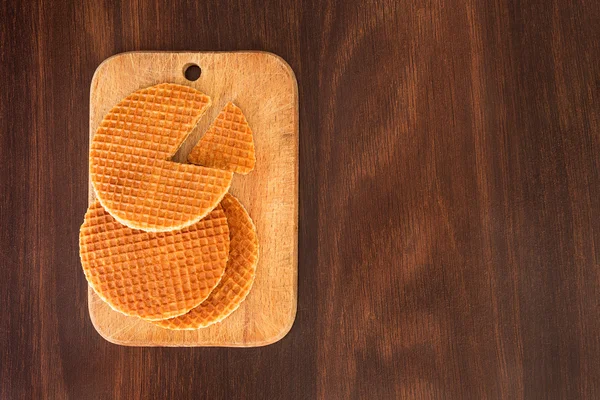 Dutch waffles on a wooden table — Stock Photo, Image