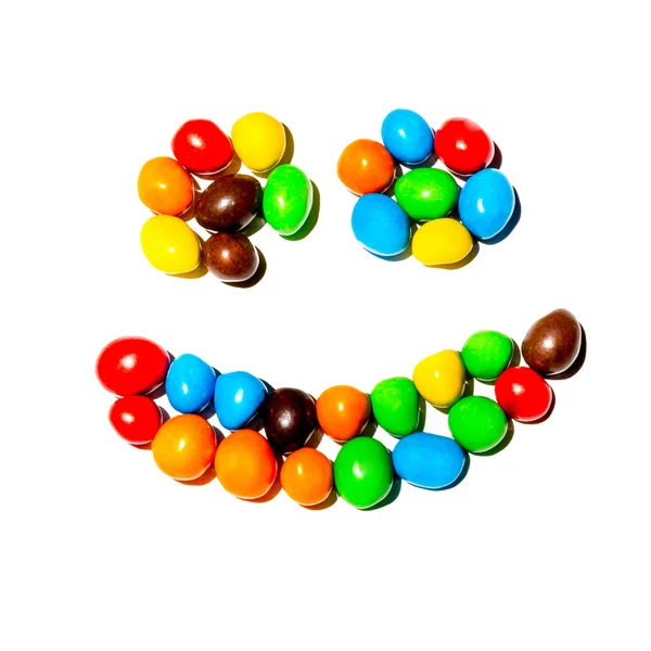 Sonríe caramelos de colores Fotos de stock libres de derechos