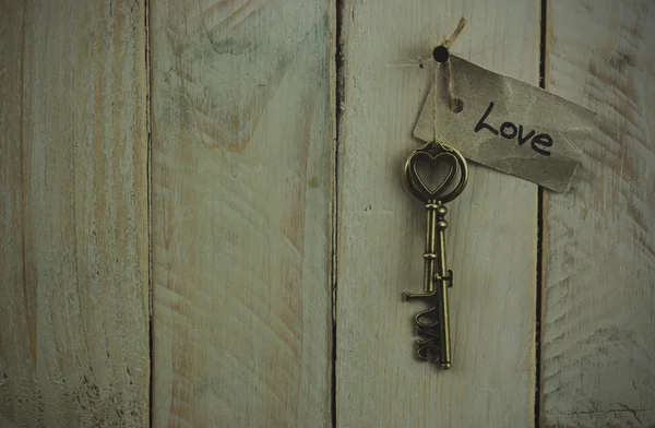 Antique keys on wooden background — Stock Photo, Image