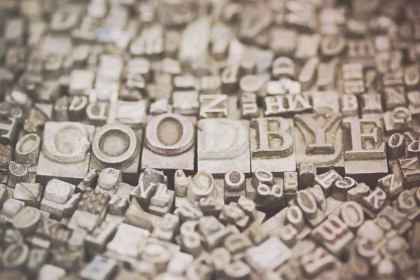 Close up of typeset letters with the word Goodbye — Stock Photo, Image