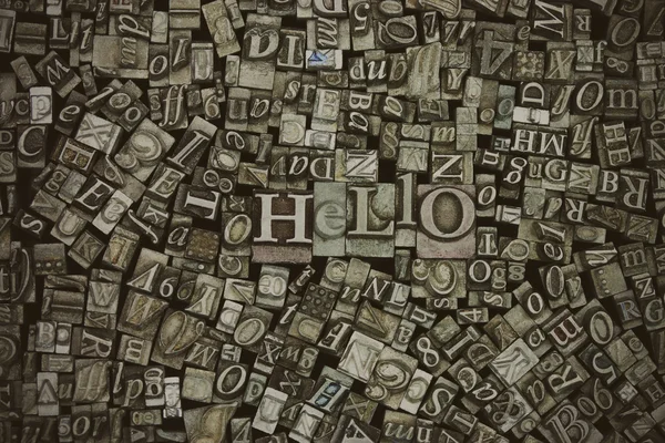 Close up of typeset letters with the word Hello — Stock Photo, Image