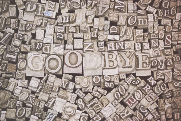 Close up of typeset letters with the word Goodbye — Stock Photo, Image