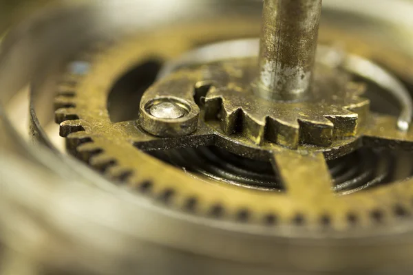 Close up of cogs inside a clock — Stock Photo, Image