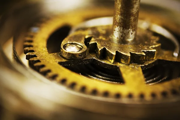 Close up of cogs inside a clock — Stock Photo, Image