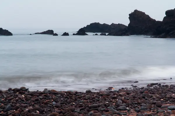 Long exposure shot of the sea coming in — Stock Photo, Image