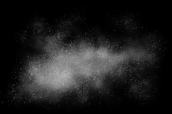 Bílý prášek abstraktní exploze na černém pozadí — Stock fotografie