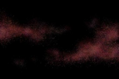 Siyah bir arka plan üzerinde renkli soyut toz patlama