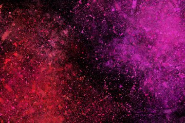 Siyah bir arka plan üzerinde renkli soyut toz patlama