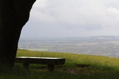 Bench with view over the Chilterns landscape in Buckinghamshire, clipart