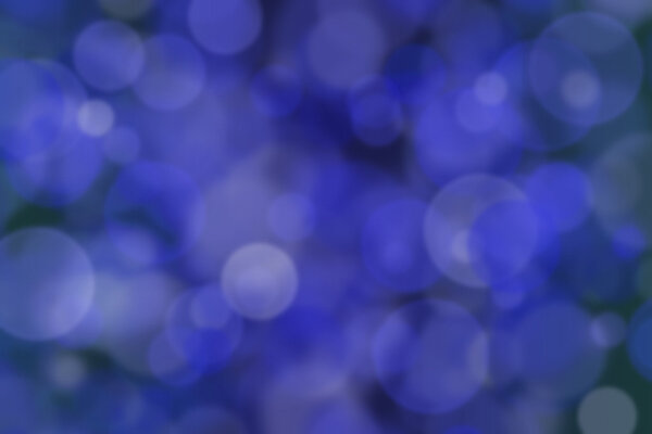 Colourful abstract bokeh design on a black background