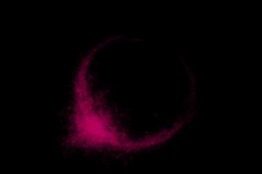 Siyah bir arka plan üzerinde renkli soyut toz patlama