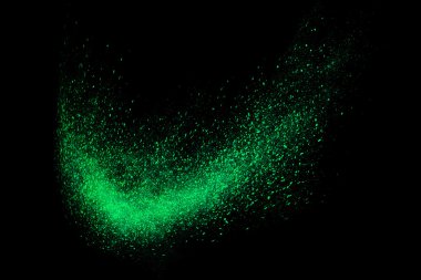 Siyah bir arka plan üzerinde renkli soyut toz patlama