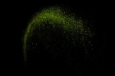 Siyah bir arka plan üzerinde renkli soyut toz patlama